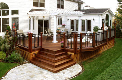 Elegant deck, pergola and patio by Archadeck